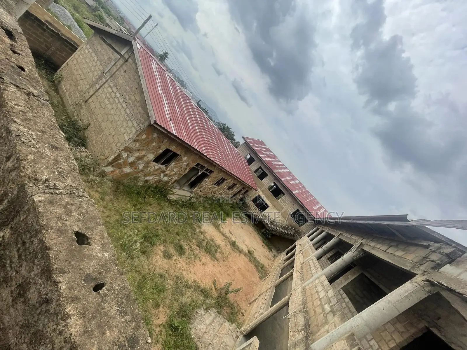 Prime School Complex on 8 Plots – Amasaman Cocobod Main Road for Sale.