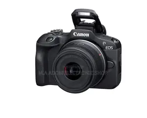 Canon Eos R100 With 18-55 Mm Lens