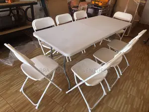 Set Of Folding Table And Chairs