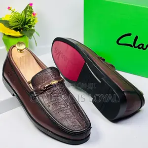 Clarks Leather Coffee Loafers With An Embossed Crocodile Pattern