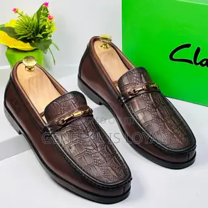 Clarks Leather Coffee Loafers With An Embossed Crocodile Pattern