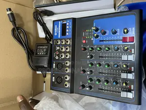 Yamaha F4usb, a 4-Channel Audio Mixer Console.