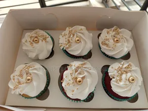 Six Red Velvet Cupcakes With Whipped Cream