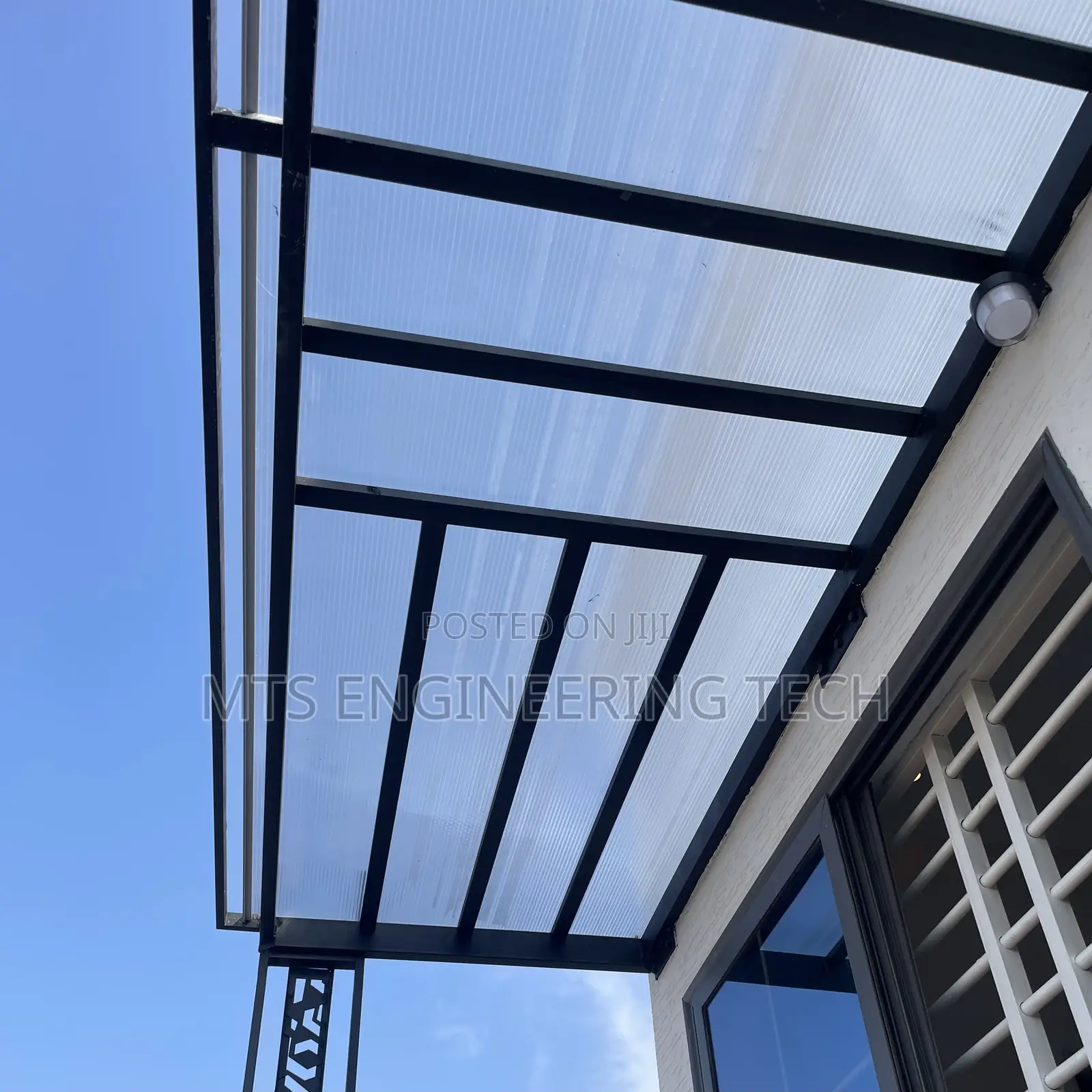 Modern Metal Shades With Polycarbonate Roofing