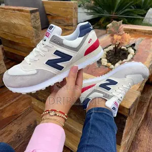 New Balance Sneaker . Comes In Box . Grade “A”