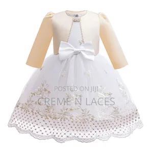 White Dress With Gold Embroidery And A Matching Bolero Jacket