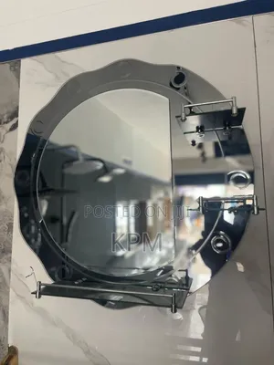 Round Bathroom Mirror With Triple Glass Shelves Attached