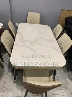 A Beautiful 6 Seater Dining Table, With a Golden Designs