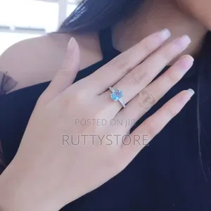 Blue Rectangular Stone Engagement Ring