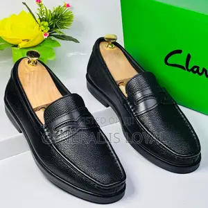 Black Leather Clarks Men's Penny Loafers.