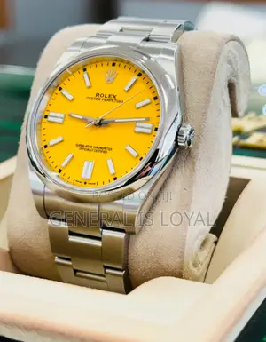 Rolex Oyster Perpetual 41mm Yellow Baton Dial And An Oyster Bracelet
