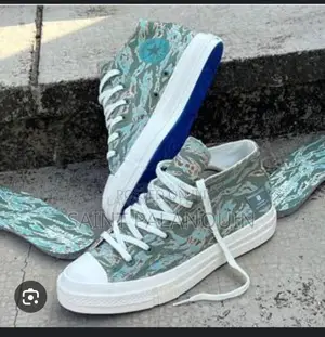 Converse X Undefeated Chuck 70 Mid