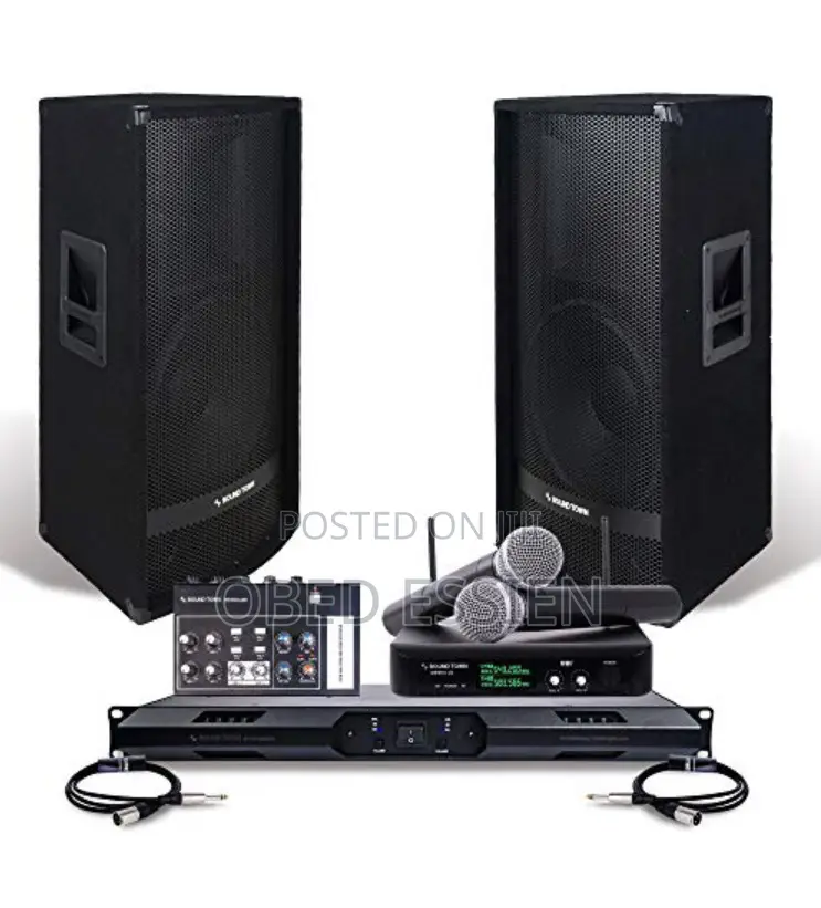 A Pair of JBL Speakers With Amp and Microphone