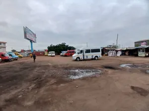 Titled 1.28 Acre Land At Madina Zingo Junction