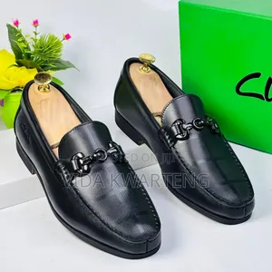 New Black Clarks Loafers With a Metal Buckle