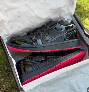Jordan 1 Low Black With Red Sole