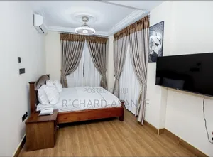 2 BDRM Vacation Apartment With Water Heater Kitchen at Kumasi Suame