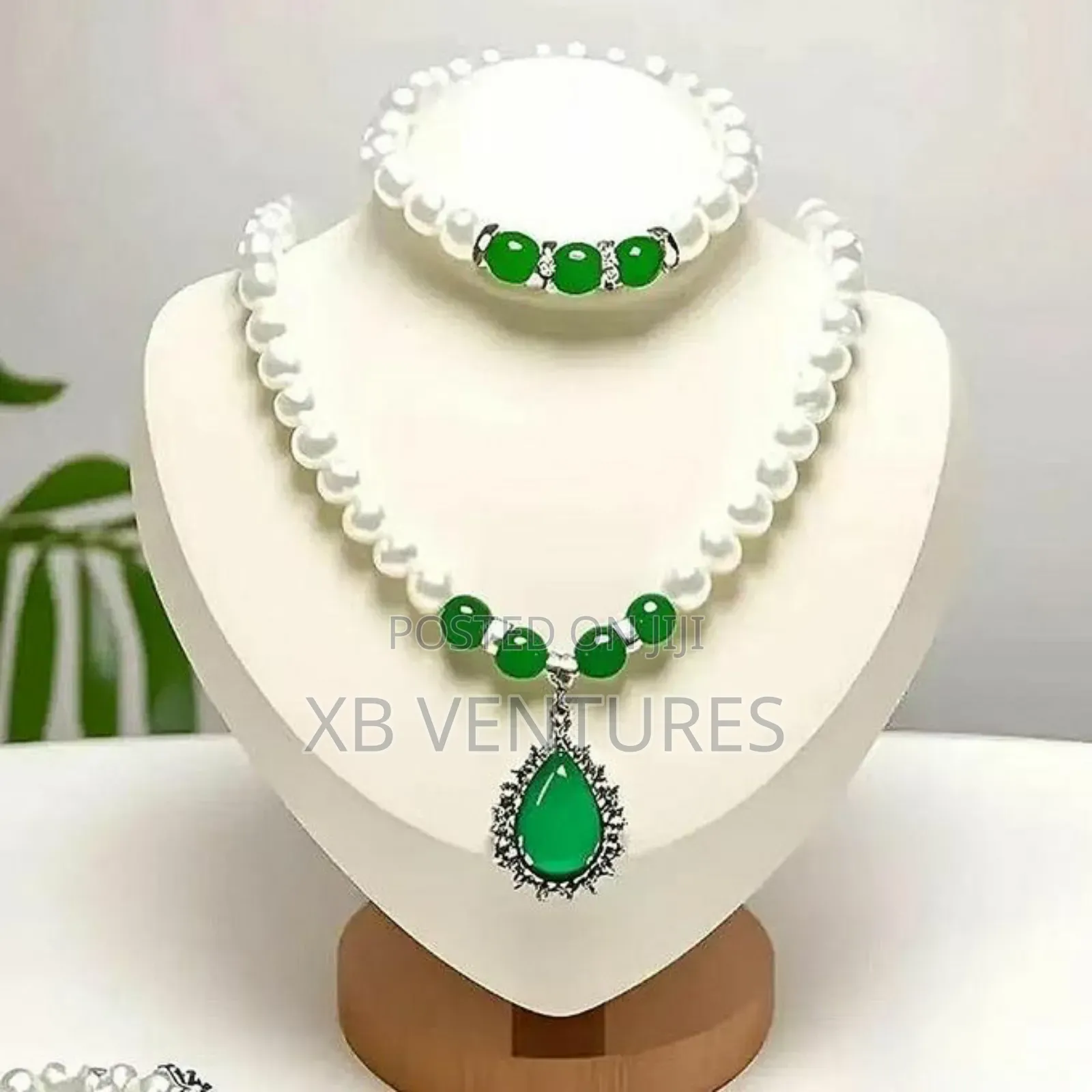 Luxury
Pearl, Green Chalcedony With Diamond Inlays