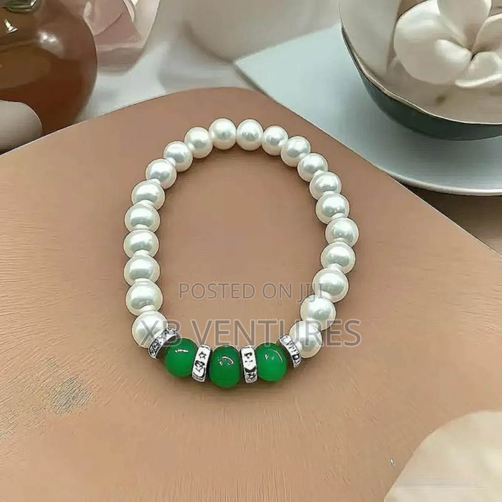 Luxury
Pearl, Green Chalcedony With Diamond Inlays