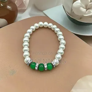 Luxury
Pearl, Green Chalcedony With Diamond Inlays