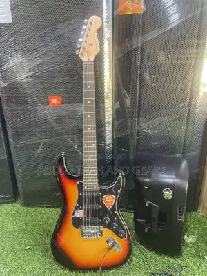Fender Lead Guitar {Brown}