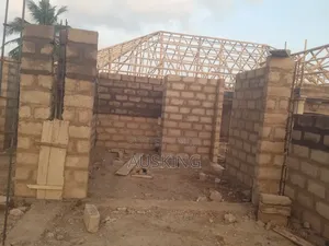 Fence Wall and Building Attached With 2 Stores