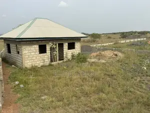 2 and Half Plots of Land With 2 Semi Completed Single Rooms ( Fenced )