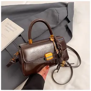 Elegant Black Mini Top-Handle Bag With Keychain