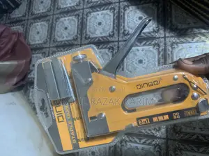 Staple Gun for Furniture Making. Carpentry and Industrial