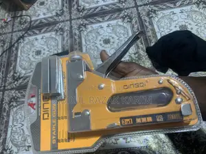 Staple Gun for Furniture Making. Carpentry and Industrial