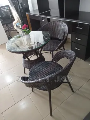 Cute Wooven Dining Set With Plain Glass Table