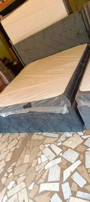 A Must Have 72x75 Queens Frame Plus Mattress
