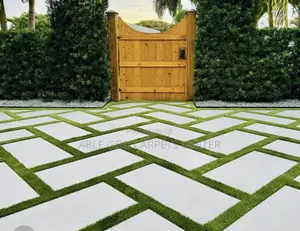 Artificial Grass and Concrete Pavers