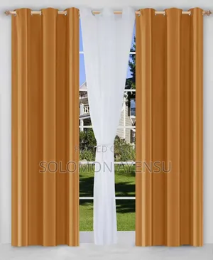 Quality Gold Sunblock Curtains and White Voile Sheer Curtains.