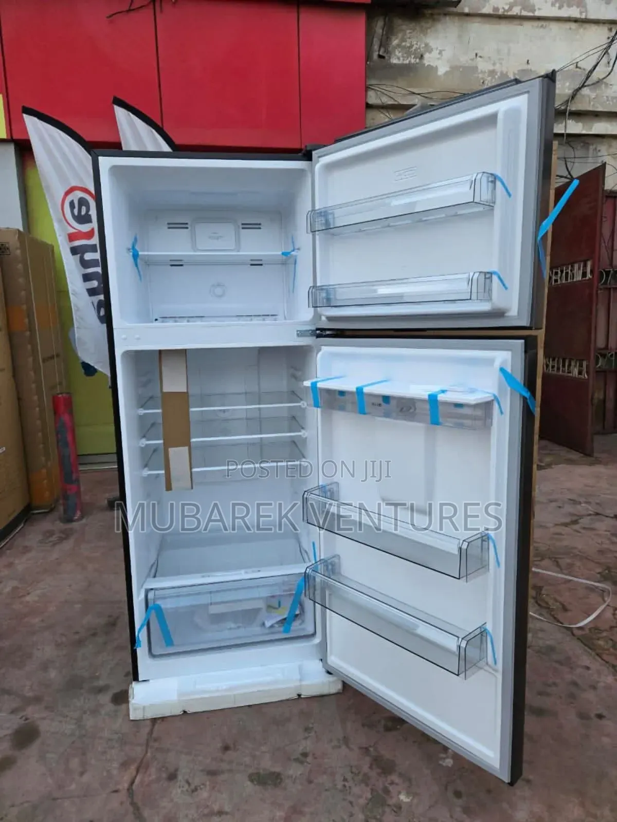 TCL 413 LTR Top Mount Refrigerator With Dispenser