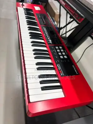 Xps-10x Expandable Synthesizer Keyboard In Red.