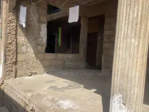 Old Structure on 1 and Half Plot at Achimota for Rent