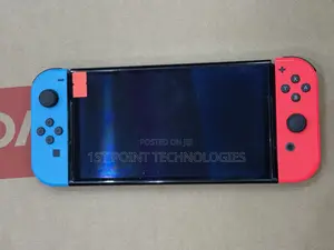 Used Nintendo Switch Oled With 10games