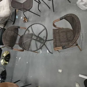 Brown Plastic Wicker Patio Dining Set.