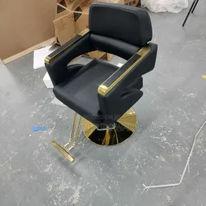 Black and Gold Hydraulic Salon or Barber Chair.