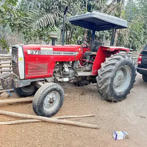 Mf 375 Tractor With Plough
