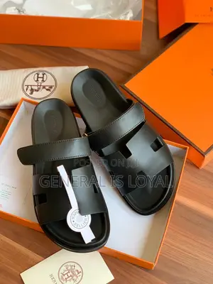 Hermès Chypre Sandals In Black Calfskin Leather.