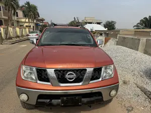 Nissan Frontier King Cab SE V6 2011 Brown