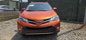 Toyota RAV4 XLE 4dr SUV (2.5L 4cyl 6A) 2014 Orange