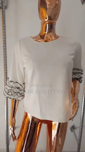 Cream Ruffle-Sleeve Blouse