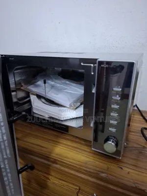 20.L Caso Microwave With Grill From Germany