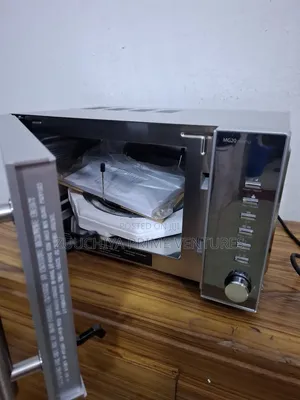 20.L Caso Microwave With Grill From Germany