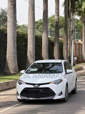 Toyota Corolla LE (1.8L 4cyl 2A) 2019 White