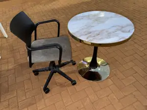 Modern Round Table With Comfortable Swivel Chair