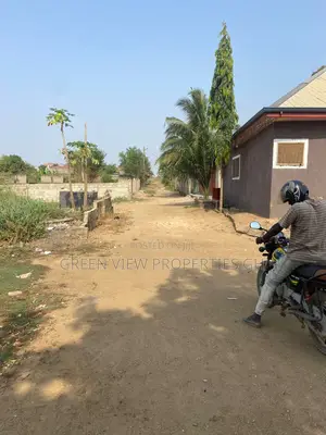 A 1 and a Half (11⁄2) Plots of Land Kasoa Obolo Estate, to Dr. Jesus.